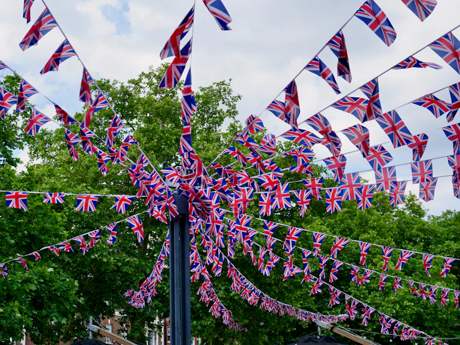 Union Jack bunting strung between trees in a London park
