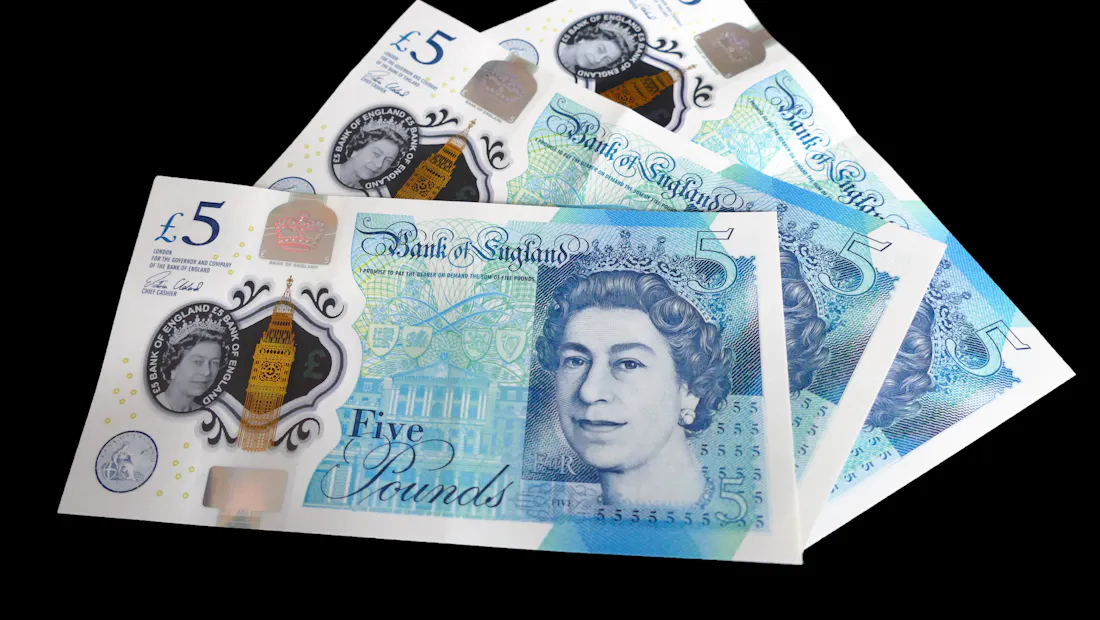 A fan of Bank of England five-pound notes